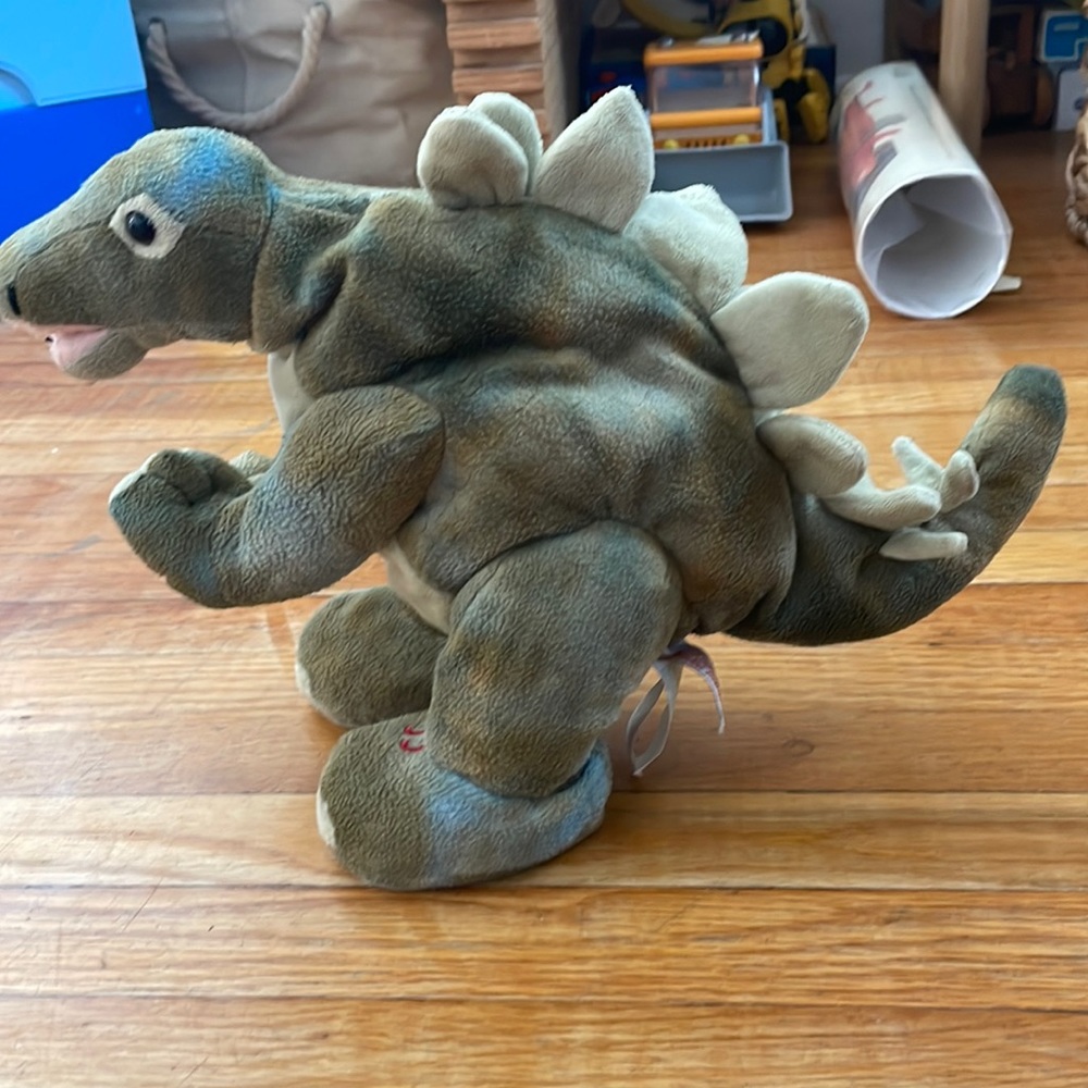 Cuddle Barn electronic stegosaurus plush